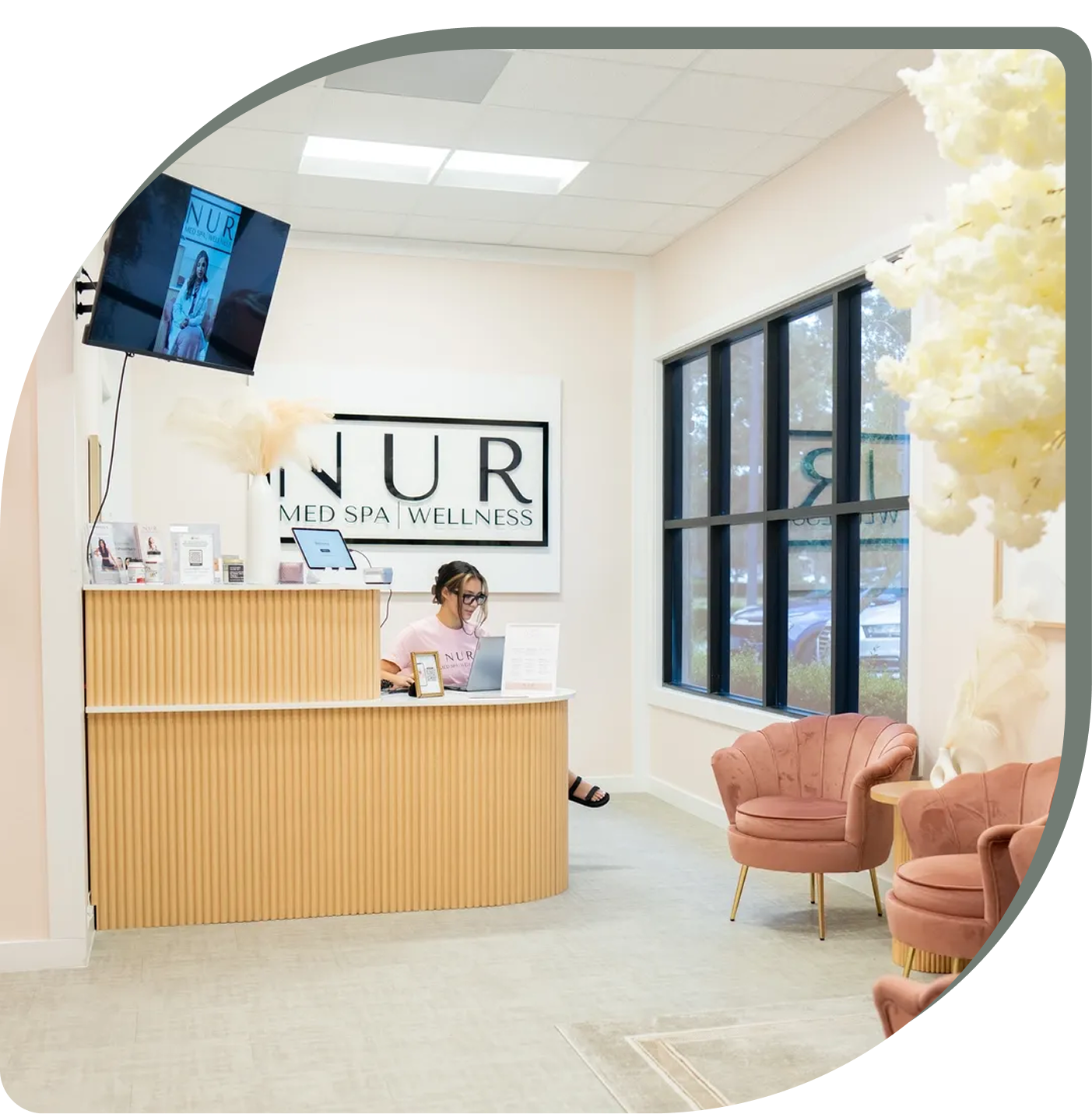 Client receiving a relaxing facial treatment at Nur Med Spa